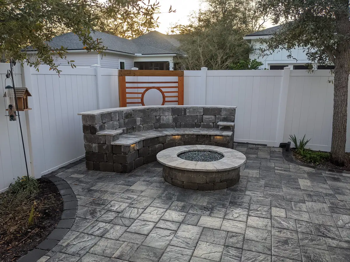 Custom fire feature with landscape lighting in Amelia Island FL