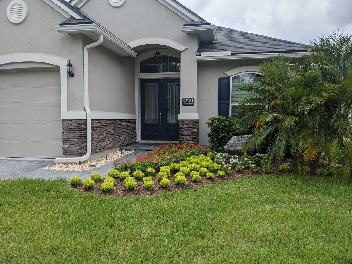 Natural stone retaining wall and garden design in Amelia Island