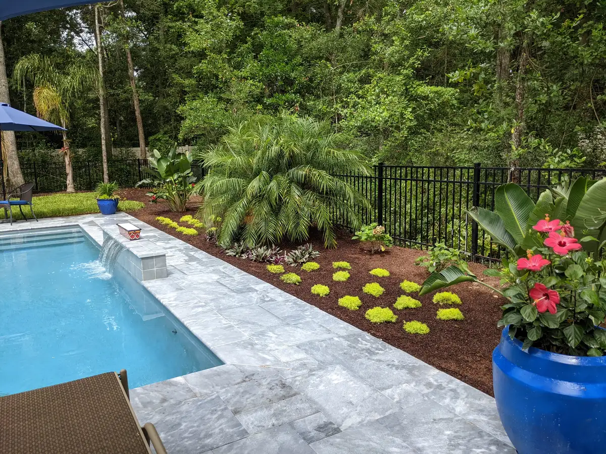 Complete landscape transformation with stonework and plantings in Ponte Vedra