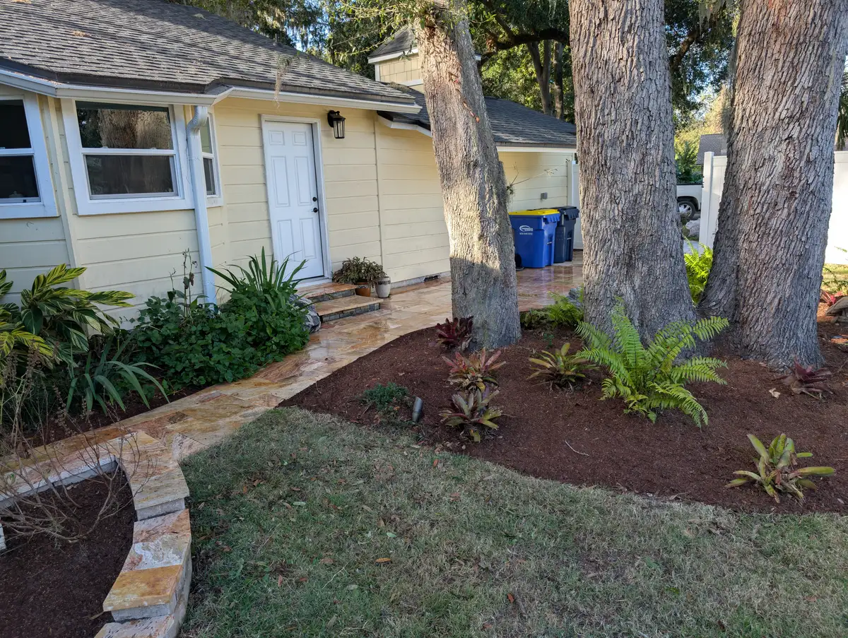 Water feature surrounded by lush native plantings