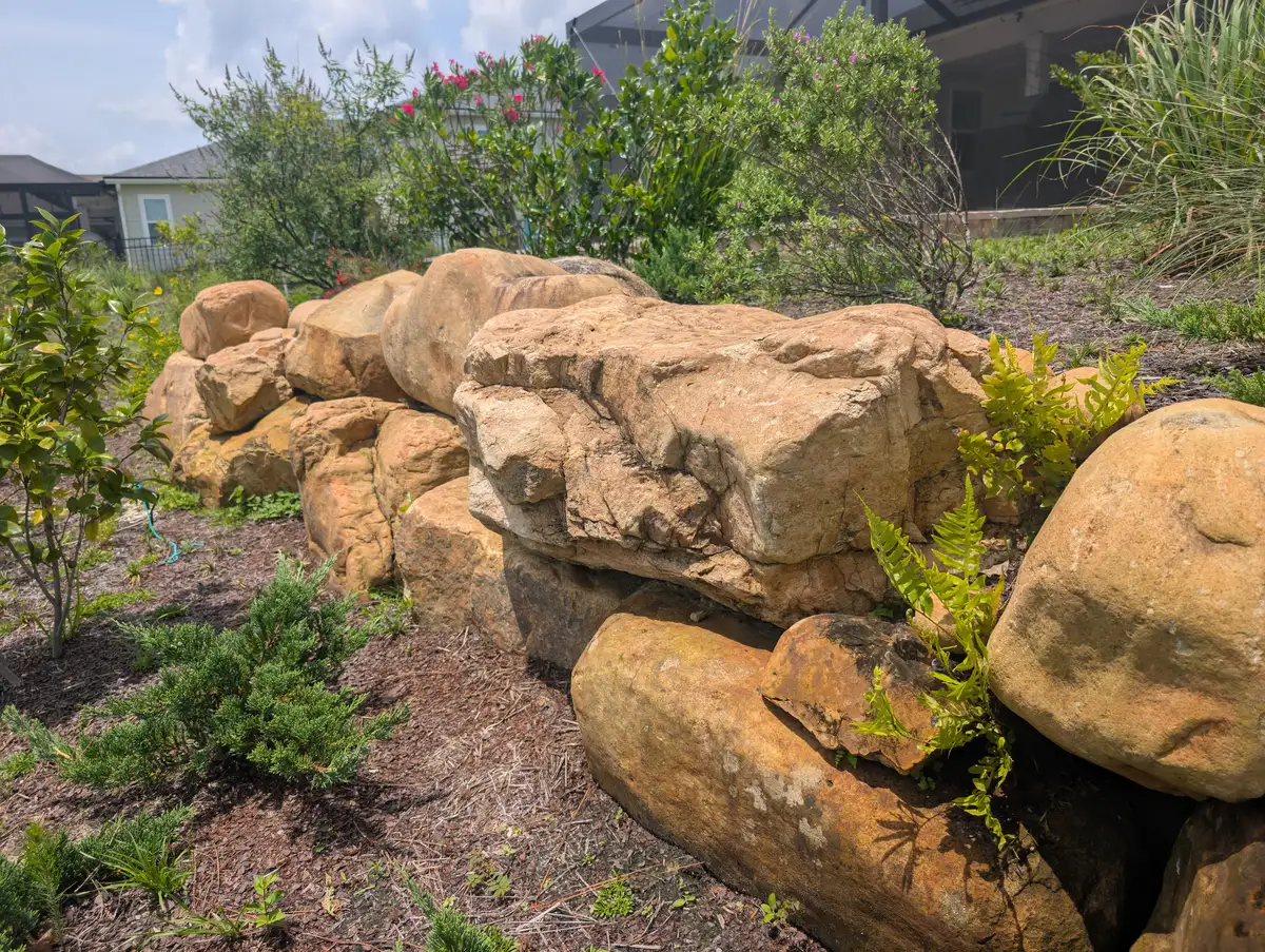 LED landscape lighting along a stone pathway at night